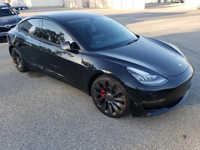 Photo 4 from auction – 2021 TESLA MODEL 3 with VIN 5YJ3E1EC3MF849814