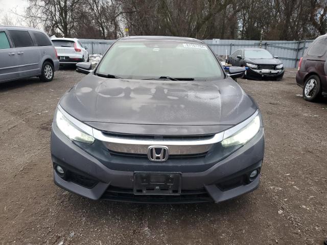 Photo 5 from auction – 2016 HONDA CIVIC TOUR with VIN 2HGFC1F92GH100539