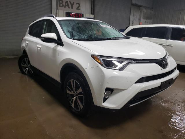 Photo 4 from auction – 2017 TOYOTA RAV4 XLE with VIN JTMWFREV0HJ106617