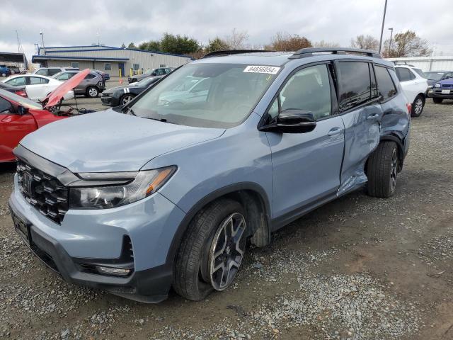 HONDA PASSPORT E 2022 with VIN 5FNYF8H09NB014539 - Photo from auction