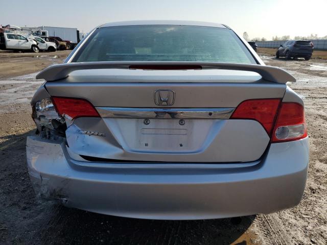 Photo 6 from auction – 2011 HONDA CIVIC LX with VIN 19XFA1F57BE046340
