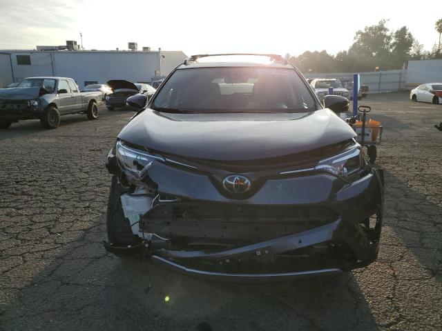 Photo 5 from auction – 2018 TOYOTA RAV4 LIMIT with VIN JTMDFREV6JJ233594