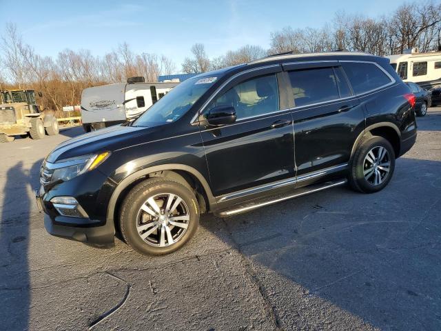 HONDA PILOT EXL 2016 with VIN 5FNYF6H83GB069145 - Photo from auction