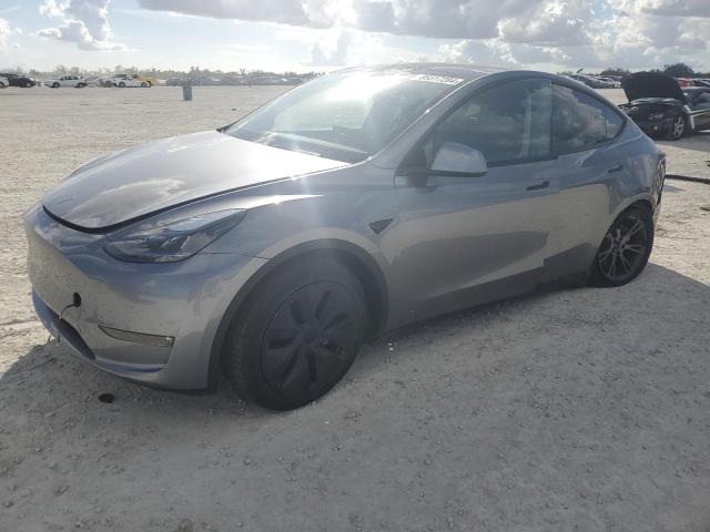TESLA MODEL Y 2024 with VIN 7SAYGAEE6RF169627 - Photo from auction