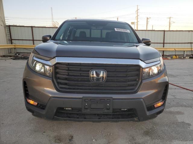Photo 5 from auction – 2023 HONDA RIDGELINE with VIN 5FPYK3F56PB009726