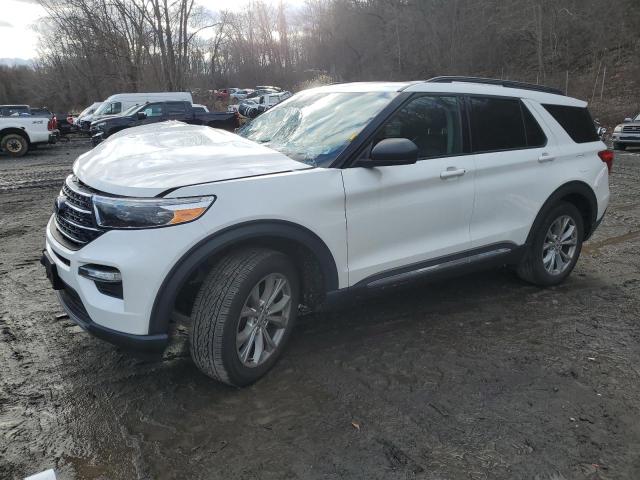 FORD EXPLORER X 2021 with VIN 1FMSK8DH6MGA10039 - Photo from auction