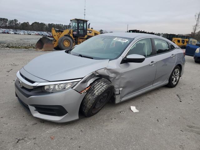 HONDA CIVIC LX 2018 with VIN 2HGFC2F50JH516275 - Photo from auction