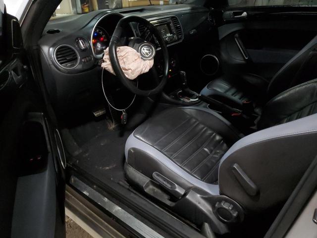 Photo 8 from auction – 2012 VOLKSWAGEN BEETLE TUR with VIN 3VWVA7AT8CM628164
