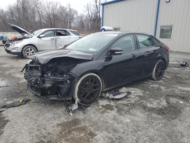 FORD FOCUS SE 2016 with VIN 1FADP3F23GL354293 - Photo from auction