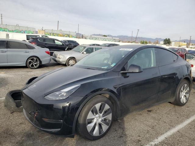 TESLA MODEL Y 2023 with VIN 7SAYGAEE2PF740429 - Photo from auction