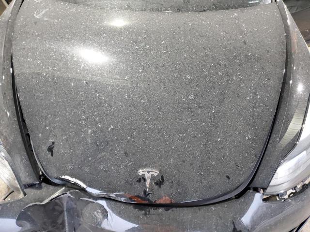 Photo 11 from auction – 2023 TESLA MODEL 3 with VIN 5YJ3E1EBXPF591769