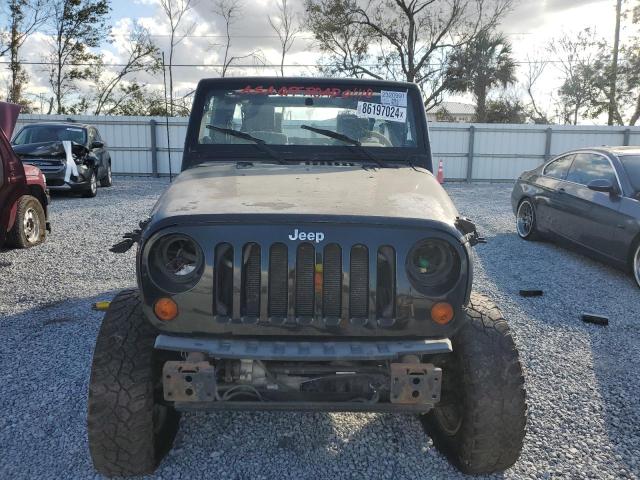 Photo 5 from auction – 2009 JEEP WRANGLER U with VIN 1J8GA69169L706971
