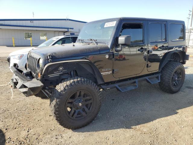 JEEP WRANGLER U 2011 с VIN 1J4BA3H17BL565796 - Фото с аукциона
