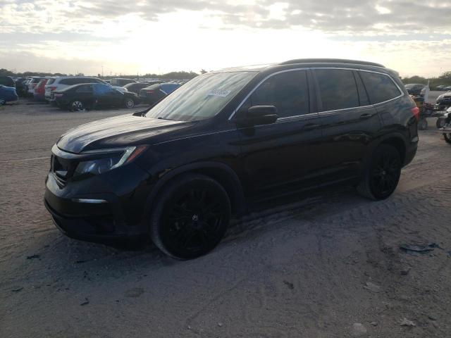 HONDA PILOT SE 2021 with VIN 5FNYF5H21MB020933 - Photo from auction