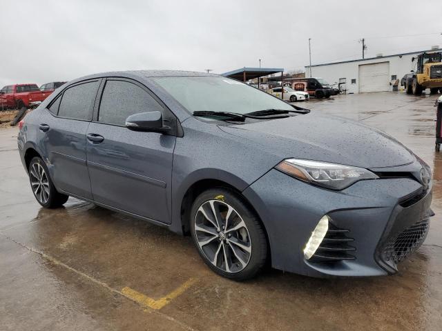 Photo 4 from auction – 2017 TOYOTA COROLLA L with VIN 5YFBURHE5HP577464