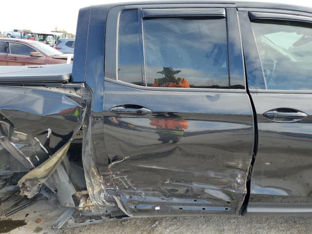 Photo 11 from auction – 2022 HONDA RIDGELINE with VIN 5FPYK3F12NB001763