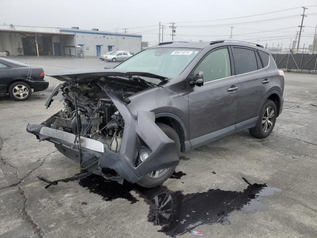 TOYOTA RAV4 XLE 2017 with VIN JTMWFREV7HJ701528 - Photo from auction