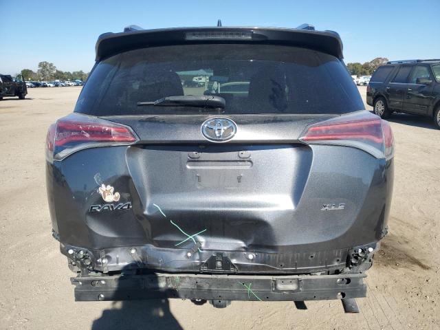 Photo 6 from auction – 2016 TOYOTA RAV4 XLE with VIN JTMWFREV4GD091178