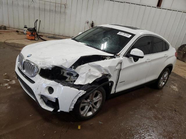 BMW X4 XDRIVE2 2015 with VIN 5UXXW3C51F0M87979 - Photo from auction
