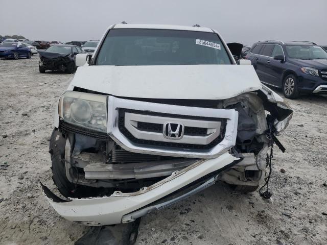 Photo 5 from auction – 2010 HONDA PILOT EX with VIN 5FNYF3H44AB009264