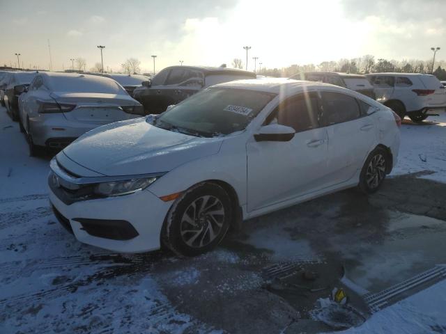 HONDA CIVIC EX 2018 with VIN 19XFC2F72JE043958 - Photo from auction