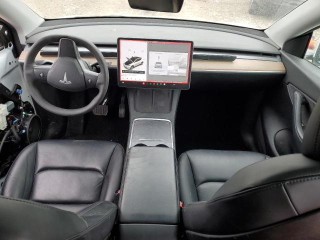 Photo 8 from auction – 2021 TESLA MODEL Y with VIN 5YJYGAEE2MF208350