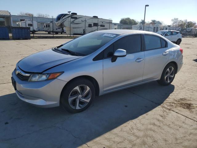 HONDA CIVIC LX 2012 with VIN 19XFB2F50CE323396 - Photo from auction