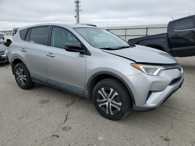 Photo 4 from auction – 2018 TOYOTA RAV4 LE with VIN 2T3BFREV5JW715529