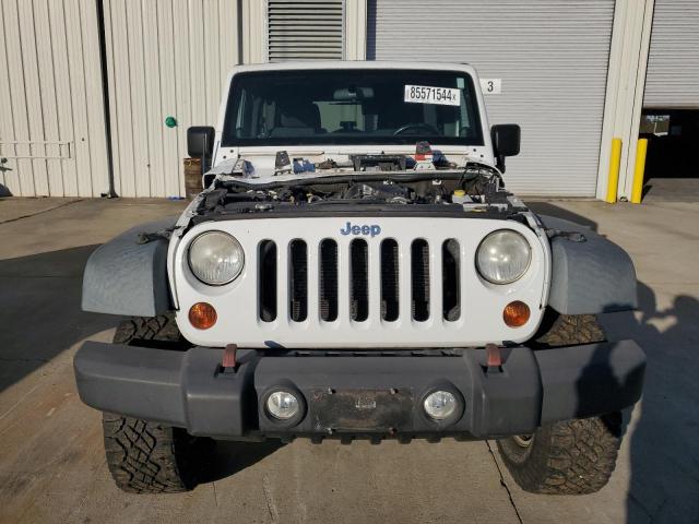 Photo 5 from auction – 2012 JEEP WRANGLER U with VIN 1C4HJWFG0CL121217