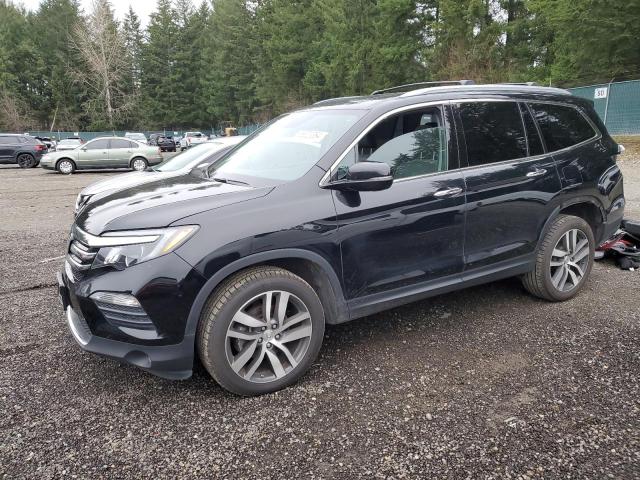 HONDA PILOT ELIT 2018 with VIN 5FNYF6H00JB011950 - Photo from auction