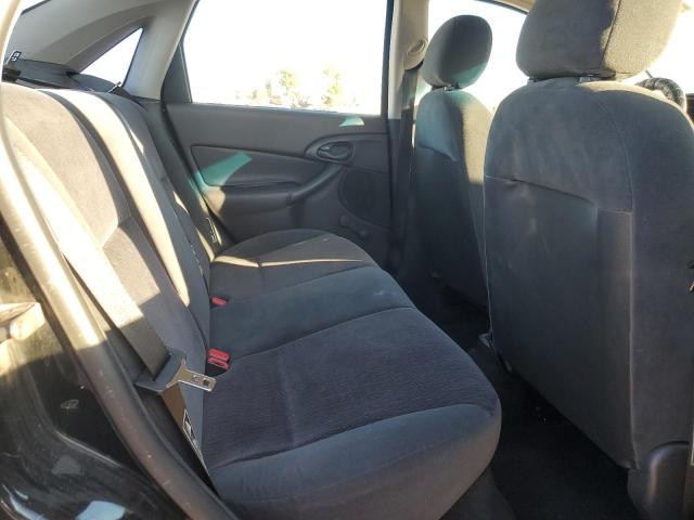Photo 10 from auction – 2000 FORD FOCUS LX with VIN 1FAFP33P8YW216936