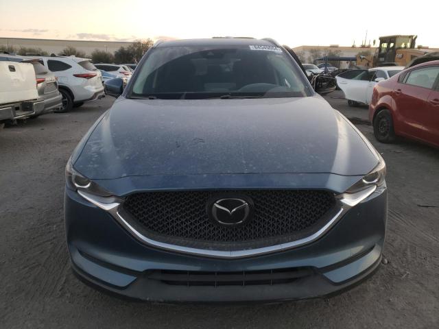 Photo 5 from auction – 2021 MAZDA CX-5 SPORT with VIN JM3KFBBM7M0326944