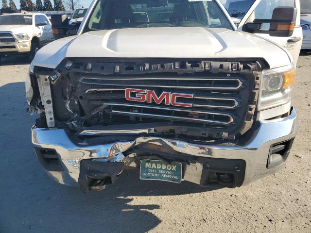 Photo 11 from auction – 2017 GMC SIERRA K25 with VIN 1GT12REG0HF140552
