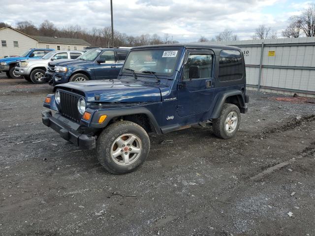JEEP WRANGLER / 2000 with VIN 1J4FA29P1YP747557 - Photo from auction