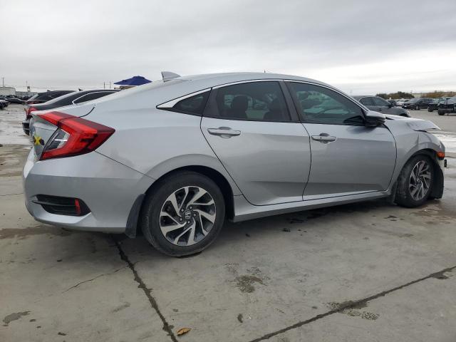 Photo 3 from auction – 2018 HONDA CIVIC EX with VIN 19XFC2F77JE041283