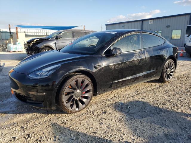 TESLA MODEL 3 2021 with VIN 5YJ3E1EC2MF856219 - Photo from auction