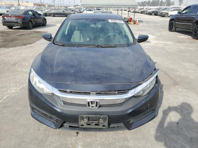 Photo 5 from auction – 2018 HONDA CIVIC LX with VIN 2HGFC2F54JH505215