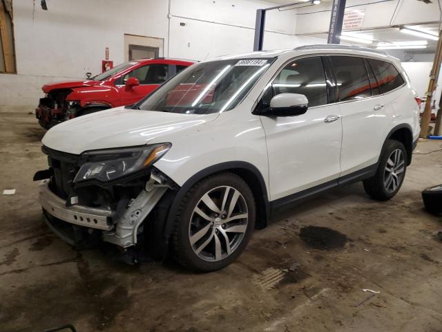 HONDA PILOT ELIT 2016 with VIN 5FNYF6H0XGB119369 - Photo from auction