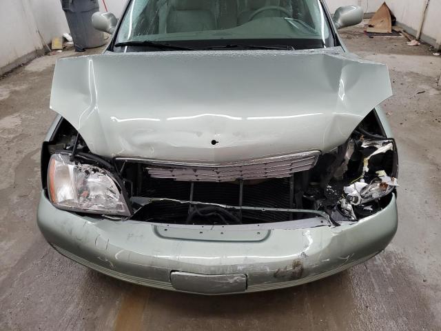 Photo 11 from auction – 2005 CADILLAC DEVILLE with VIN 1G6KD54Y75U214920