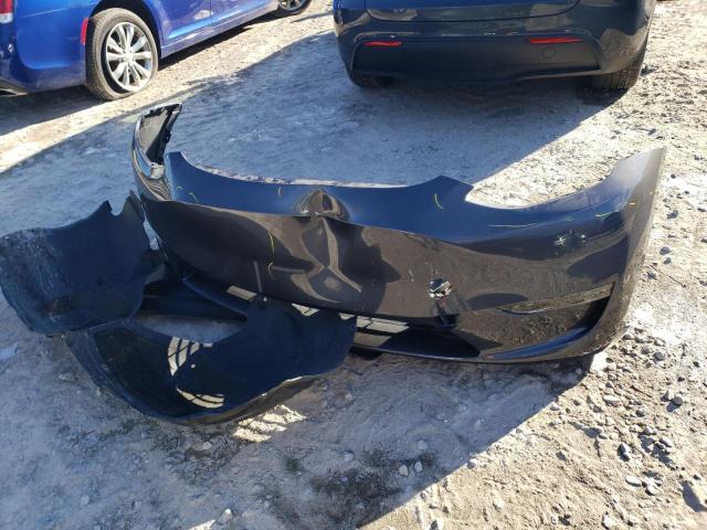 Photo 13 from auction – 2023 TESLA MODEL Y with VIN 7SAYGDEE9PA139050