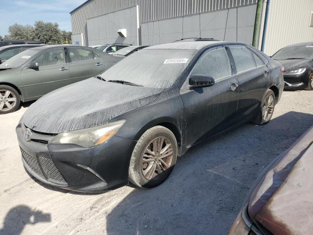 TOYOTA CAMRY LE 2015 with VIN 4T1BF1FKXFU494712 - Photo from auction