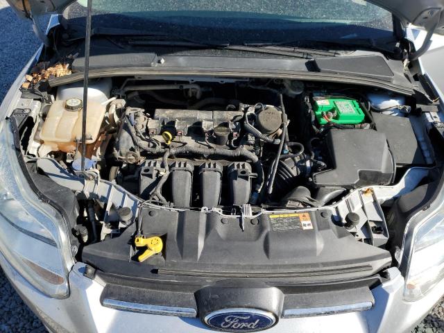 Photo 11 from auction – 2013 FORD FOCUS SE with VIN 1FADP3F29DL351572