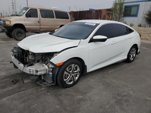 HONDA CIVIC LX 2018 with VIN 2HGFC2F53JH566443 - Photo from auction