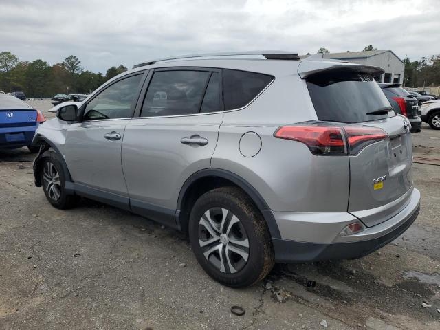 Photo 2 from auction – 2018 TOYOTA RAV4 LE with VIN JTMZFREV2JJ199093