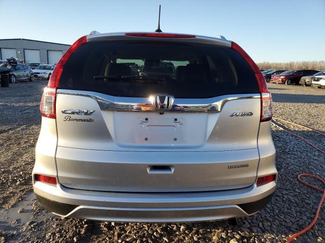 Photo 6 from auction – 2016 HONDA CR-V TOURI with VIN 5J6RM4H94GL049940