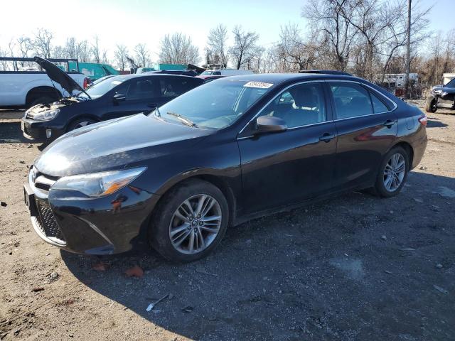 TOYOTA CAMRY LE 2016 with VIN 4T1BF1FK2GU585670 - Photo from auction