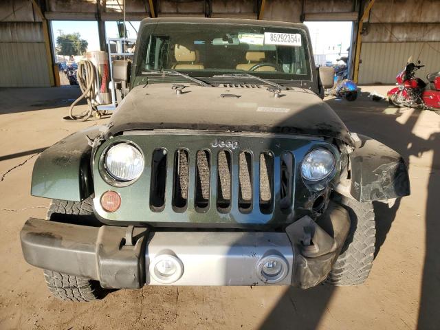 Zdjęcie 5 z aukcji – 2011 JEEP WRANGLER U z VIN 1J4BA5H13BL544178