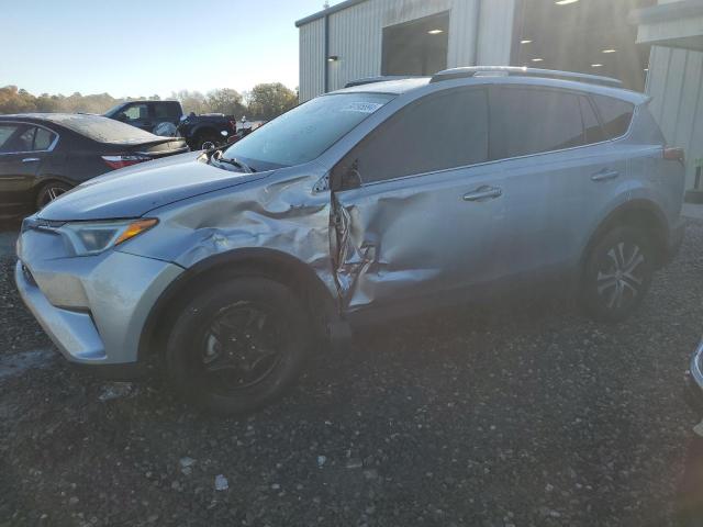 TOYOTA RAV4 LE 2018 with VIN 2T3ZFREV0JW424662 - Photo from auction