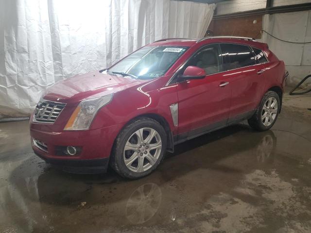 CADILLAC SRX PERFOR 2014 with VIN 3GYFNFE33ES596085 - Photo from auction