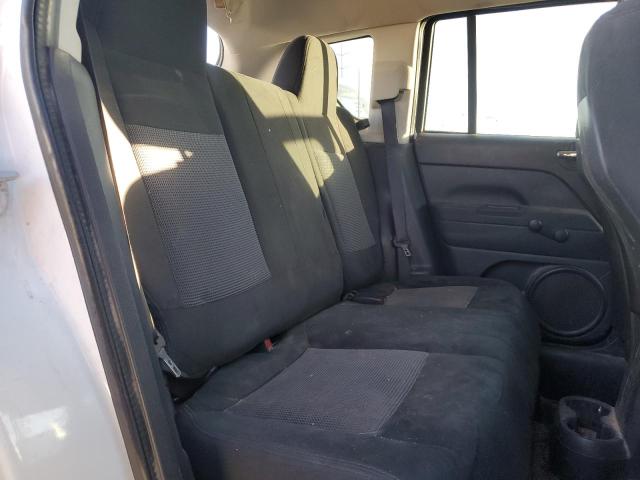 Photo 11 from auction – 2014 JEEP COMPASS SP with VIN 1C4NJCBA0ED585558